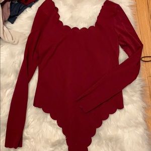 Red scalloped jump suit